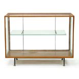 An oak shop cabinet, mid 20th c, with adjustable plate glass shelf, 92cm h; 46 x 122cm Lacks rear