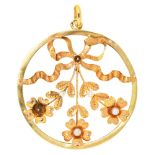 A French circular gold festoon and ribbon bow pendant, with two cultured pearls, 36cm diam, tete d'