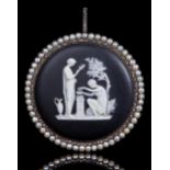 A diamond and split pearl pendant, early 20th c, in gold, set with a Wedgwood black jasper ware