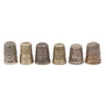 Four silver and two nickel brass inscribed or commemorative thimbles, late Victorian-George V, one