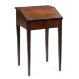 A George III oak bureau, the interior fitted with five drawers, on square tapered legs, 89cm h; 45 x