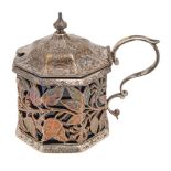 A Victorian  octagonal silver openwork mustard pot, the sides with naturalistic flowers and