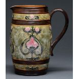 A  Doulton ware Art Nouveau jug, c1905, of barrel shape and relief decorated with seed pods, 22cm h,