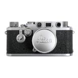 A Leica IIIf chrome rangefinder camera, serial number 658941 (1953) LOOPN, red dial and self-timer