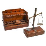 A pharmacist's mahogany bottle stand and boxwood pill silverer, S Maw, Son & Sons,  with drawer