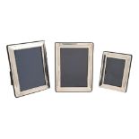Three Elizabeth II silver photograph frames, 15 x 11.5cm and smaller, by Carrs of Sheffield Ltd,