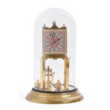 A brass anniversary clock, beneath glass dome, 30cm h