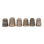 One Victorian, One Edward VII and four George 5 silver thimbles, various sizes, all Birmingham, by