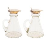 A pair of George V silver mounted glass noggins, 10.5cm h, maker R R, Birmingham 1930 Light wear