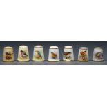 Seven Royal Worcester thimbles, late 19th c and later, painted with birds, five signed, one of the
