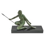 Oudine. An Art Deco bronze sculpture of a huntress holding a spear, green patina rubbed in places,