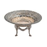 An Edwardian silver sweetmeat dish on detachable stand, spirally lobed and embossed with leafy