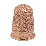 A Victorian 9ct gold thimble, Louise pattern, 24mm h, by Charles Horner, Chester 1899 and marked
