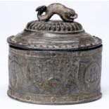 A George III oval lead tobacco jar and cover, cast with the arms of the Borough of Leeds flanked