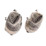 A pair of Victorian cast silver fish novelty pepperettes, with threaded covers on bun feet, 55mm