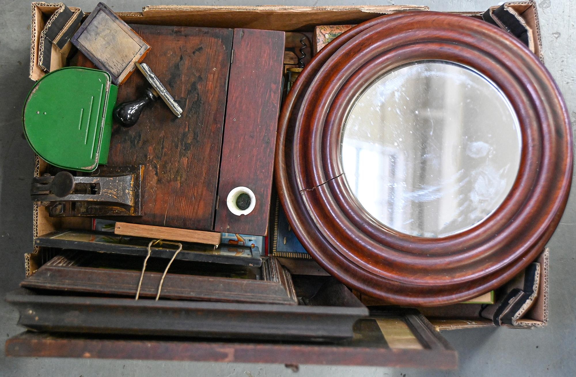 Two graduated Edwardian circular mahogany mirrors, a Victorian writing box, brass corkscrew,
