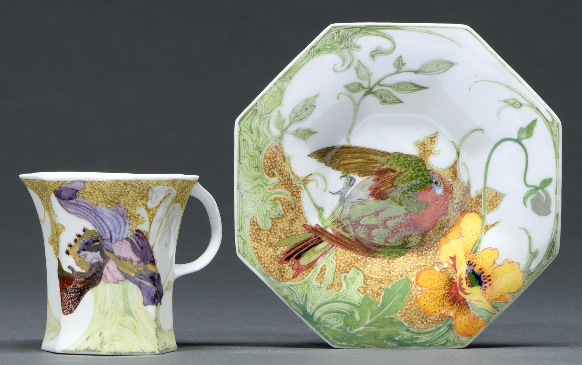 A Rosenburg eggshell porcelain Art Nouveau octagonal cup and saucer, 1904, painted with a bird and