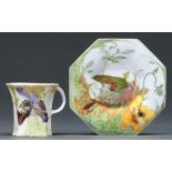 A Rosenburg eggshell porcelain Art Nouveau octagonal cup and saucer, 1904, painted with a bird and