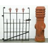 A wrought iron garden gate, early 20th c, overall size 106cm h x 88cm and a terracotta chimney