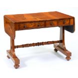 A George IV rosewood sofa table, fitted with drawers and opposing blind drawers, on swept ends