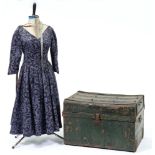 A dressmaker's mannequin and a green painted trunk Both shabby / dusty from long term storage, trunk