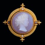 An Etruscan revival hardstone cameo brooch-pendant, the finely carved agate cameo with a classical