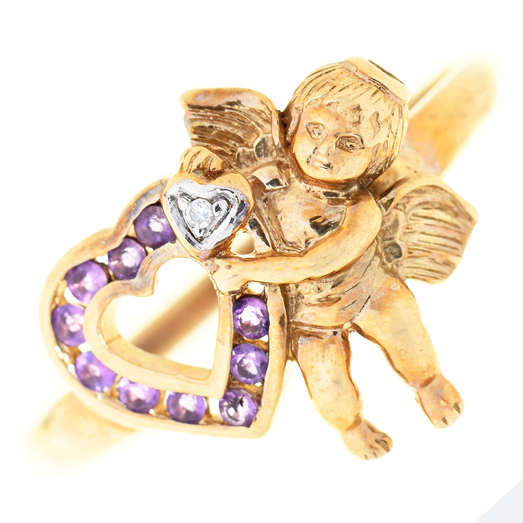 An amethyst and diamond cherub-and-heart ring, in 9ct gold, 2.8g, size U½ Good condition