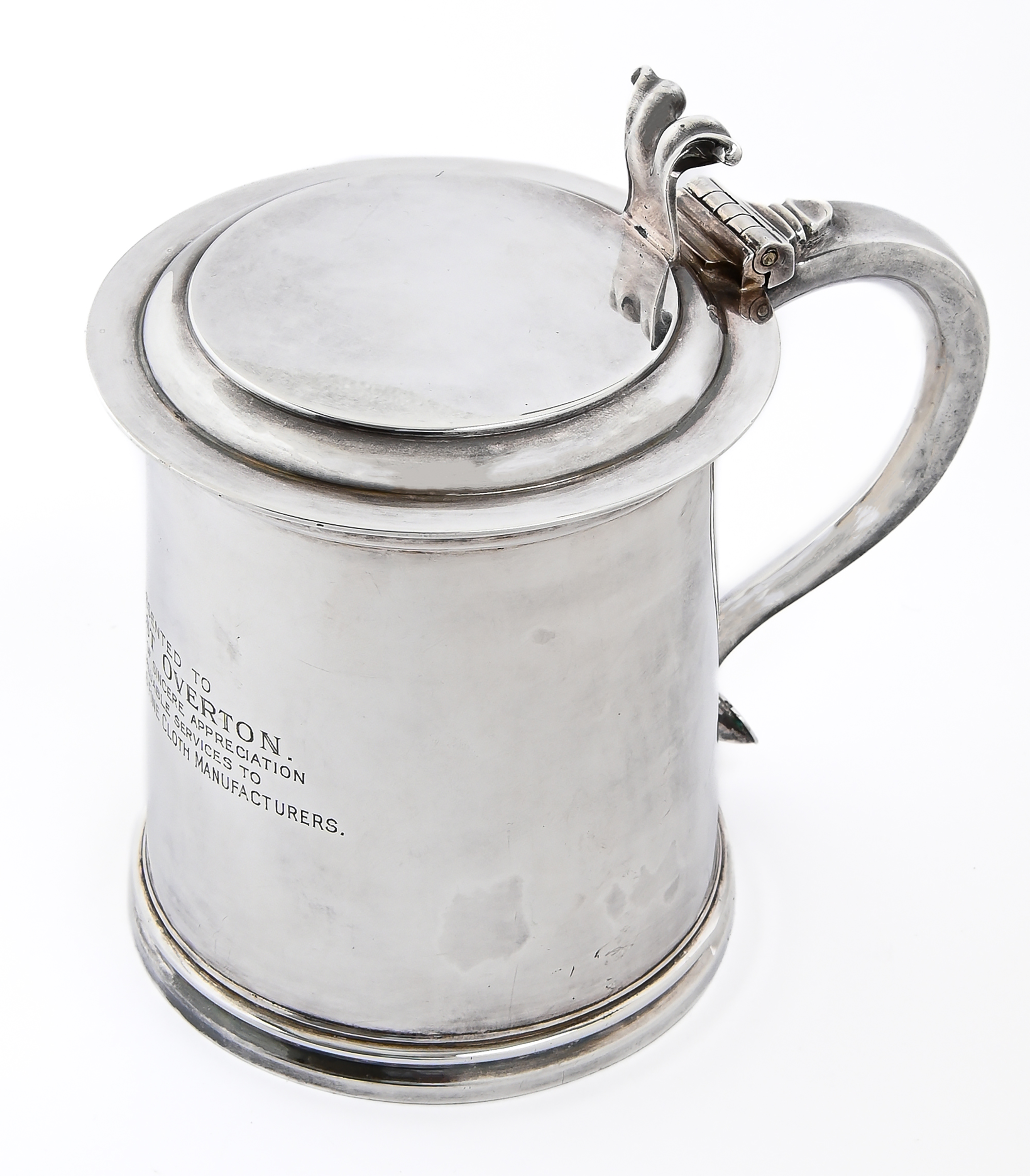 A George V silver tankard, in Charles II style, with bifurcated thumbpiece, the tapered handle