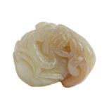 A Chinese jade pebble carving, with a dog of Fo, toad and snake, 44mm l Good condition