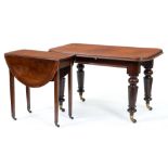 A Victorian mahogany table, the moulded oblong top on turned fluted legs, brass castors, 72cm h;