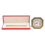 A Cartier giltmetal and French grey enamel strut timepiece alarm clock,  75 x 75mm and a Le Must