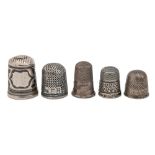 A niello thimble,  French or Russian, three miniature silver thimbles and one other, 19th and 19th