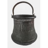 An Indian tinned copper pail, early 20th c,  with iron handle, 34cm h excluding handle Some rust