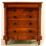 A Victorian mahogany chest of drawers,  with spiral pillars and black glazed earthenware knobs,