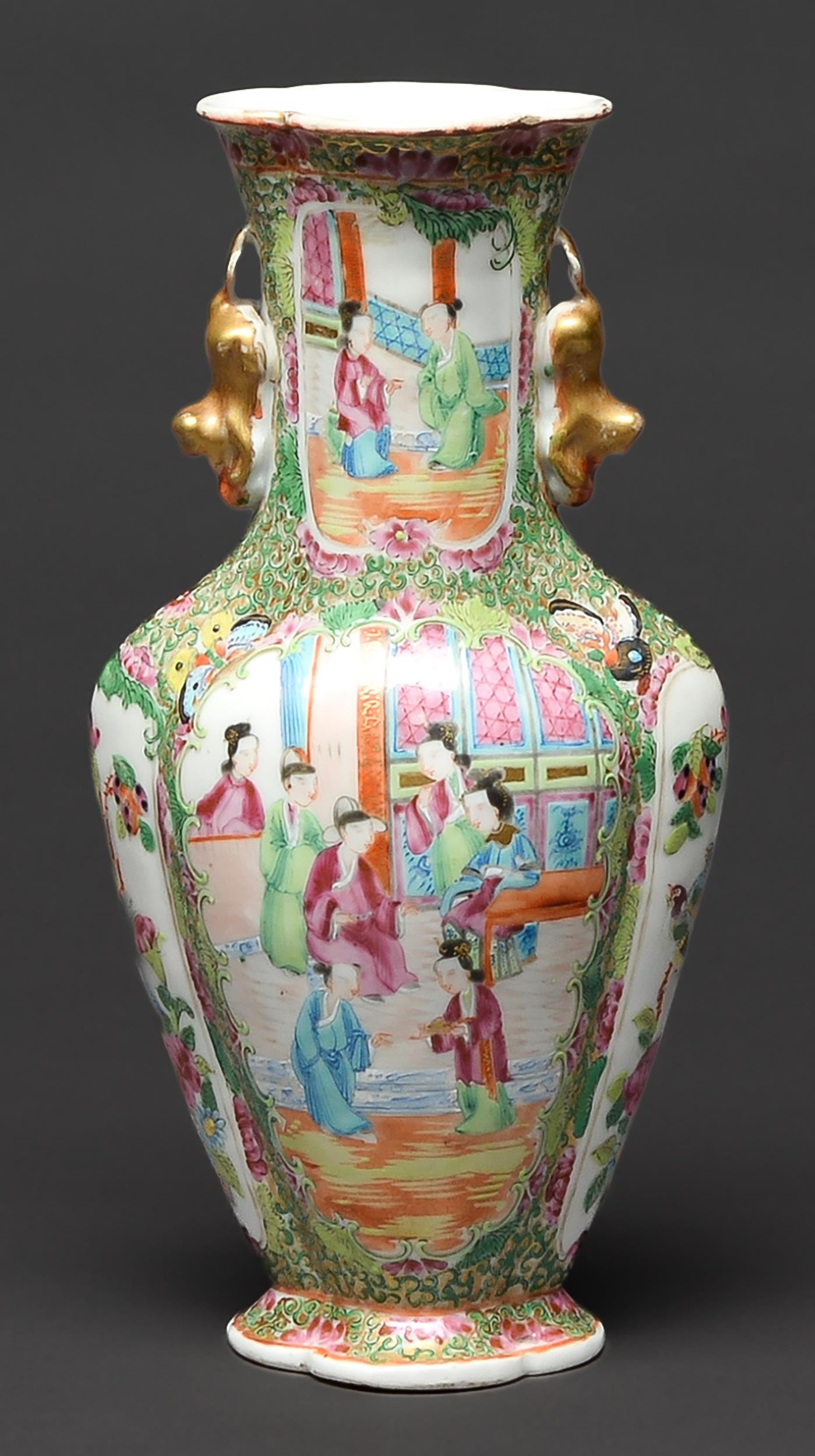 A Chinese Canton famille rose vase, 19th c, with gilt lion dog handles, typically enamelled with