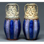 A pair of Doulton ware slip cast two handed vases, 1912-c1930, 27cm h, impressed mark, incised