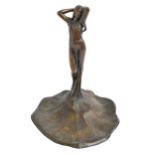 A bronze statuette of a nymph in Art Nouveau style, 20th c, the figure issuing from a waterlily