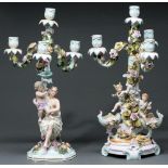 Two Sitzendorf floral encrusted candelabra and matching four light branches, c1900, supported by