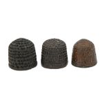 Three European brass thimbles, 16th c or earlier, 18-21mm h All in reasonably good condition