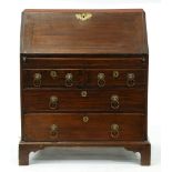 A George III oak bureau, the stepped interior with well, 97cm h; 48 x 81cm Old repairs and