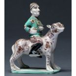 A Chinese miniature porcelain equestrian figure, 20th c,  decorated predominately in aubergine,