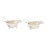 A pair of George VI silver sauceboats, with flying scroll handle, 15.5cm l, by Adie Brothers Ltd,