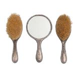 A George V silver brush set, hand mirror 23cm l, by H Matthews, Birmingham 1916 (3) Typical wear and