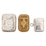 A Victorian silver vesta case and another, foliate engraved, 39 and 50mm h, both Birmingham, the