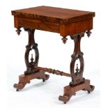 A Victorian rosewood card table, on scrolling uprights with turned stretcher and recessed castors,