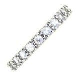 A white stone eternity ring,  white gold mount marked 18ct, 3.2g, size L