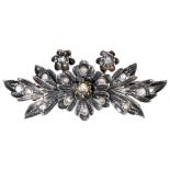 A diamond spray brooch, 19th c, in silver, 71mm l, originally part of a larger article, with gold