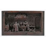 A Victorian carved oak relief, dated 1894, of the scene of hapless monks in a medieval kitchen,