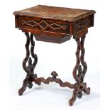 A Victorian serpentine walnut work table, the top in  quarter burr veneers, on pierced and moulded