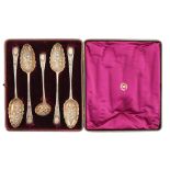 A Victorian chased and parcel gilt five-piece silver 'berry' service, Old English pattern, spoons by